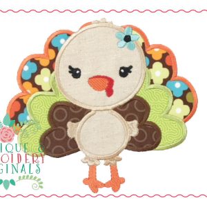 043 Turkey Girl with Flower Applique Design